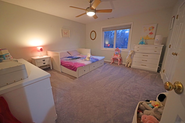 bedroom with light carpet and ceiling fan