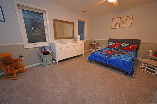 bedroom featuring ceiling fan and carpet flooring