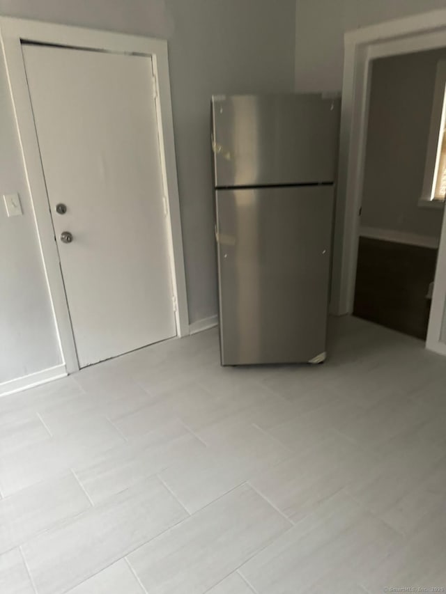 kitchen featuring stainless steel refrigerator