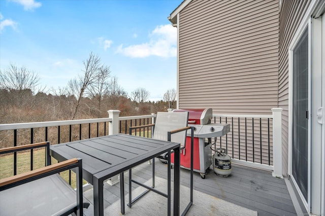 wooden terrace with grilling area