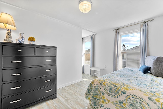 bedroom with light wood-type flooring