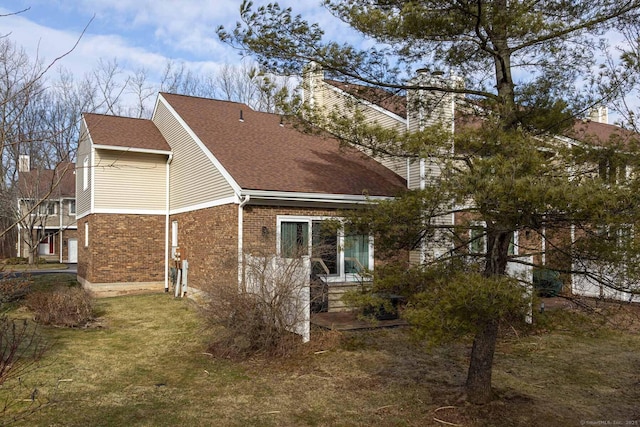 131 Hunters Ln Unit 131, Newington, CT 06111 - view of home's exterior featuring a yard