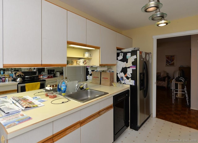 kitchen with white cabinetry, sink, dishwasher, and stainless steel refrigerator with ice dispenser