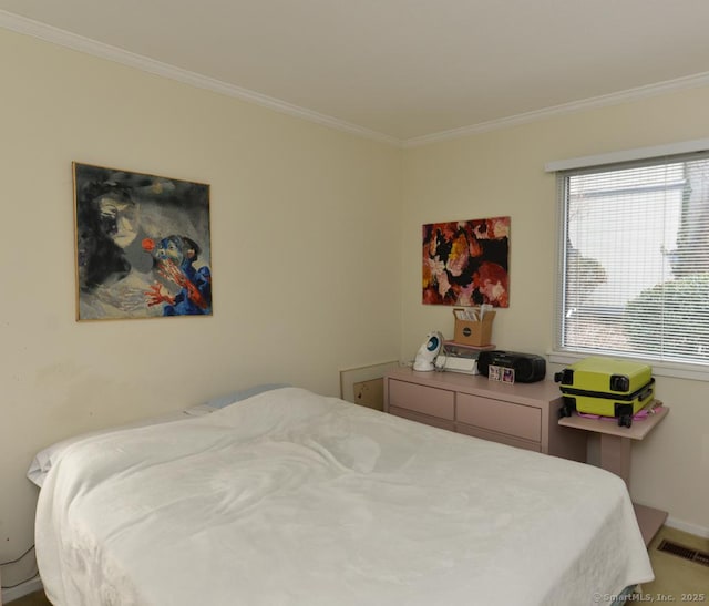 bedroom with ornamental molding