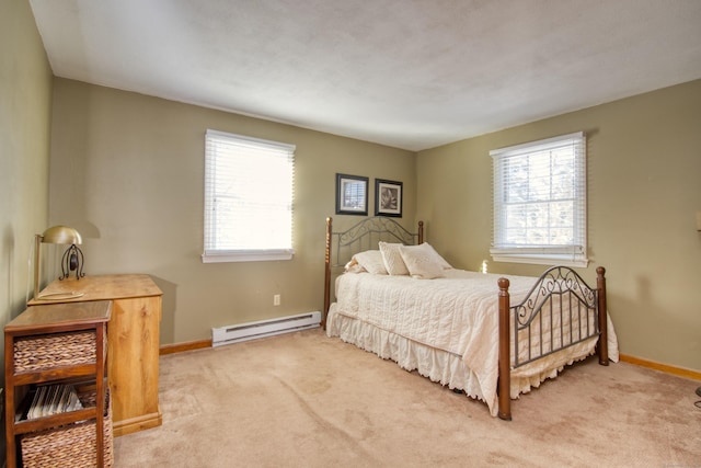 carpeted bedroom featuring a baseboard radiator