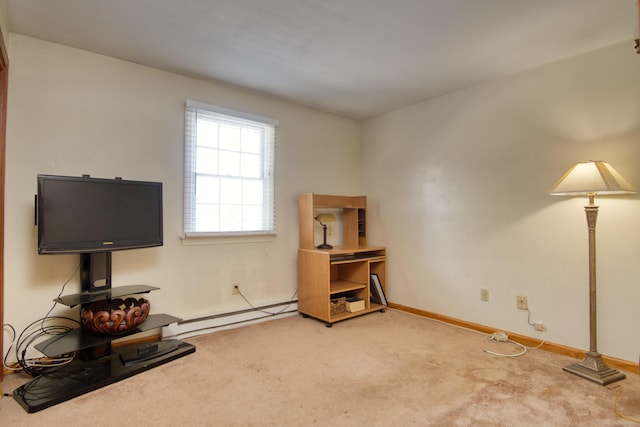 misc room with carpet flooring and a baseboard heating unit