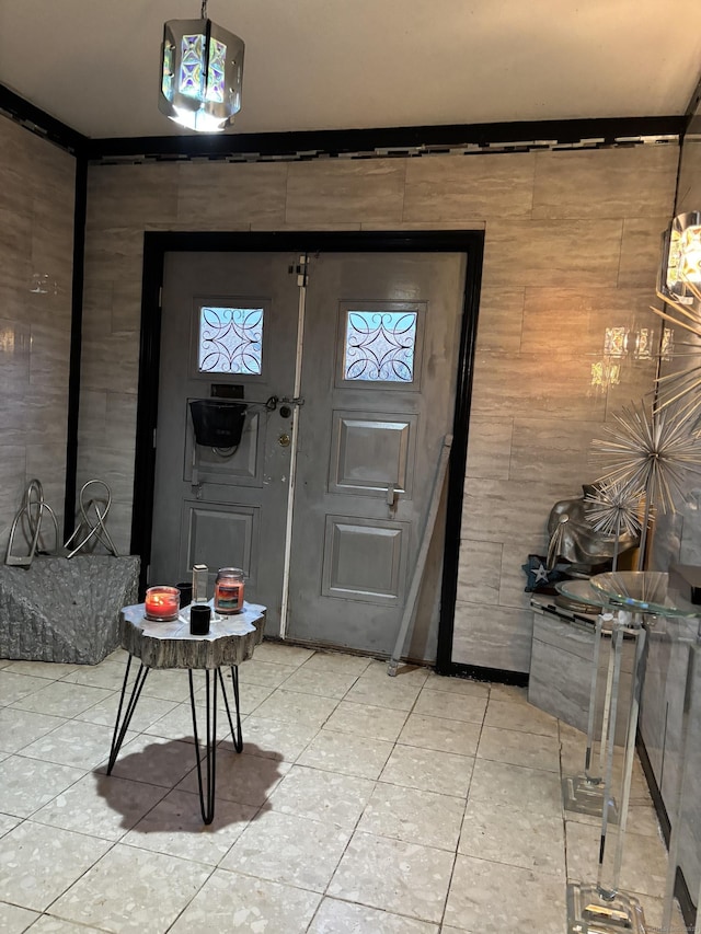 entryway featuring light tile patterned floors