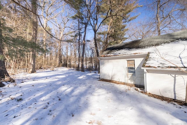 view of yard layered in snow