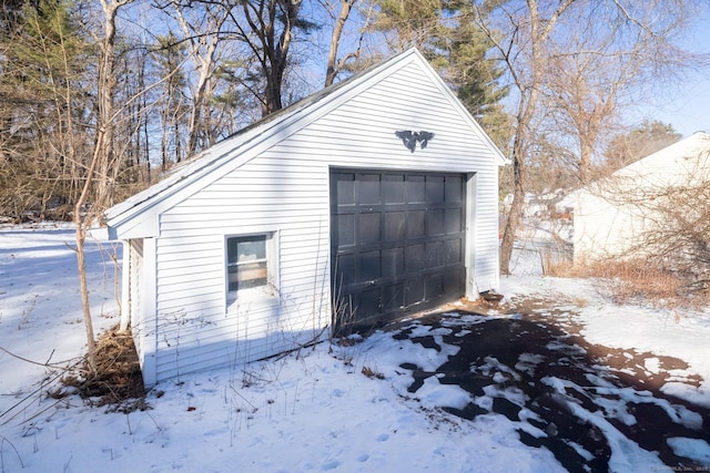 view of snow covered garage