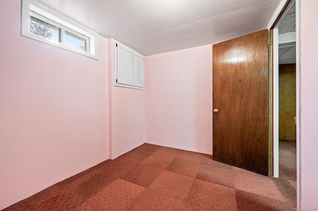 basement with wood walls