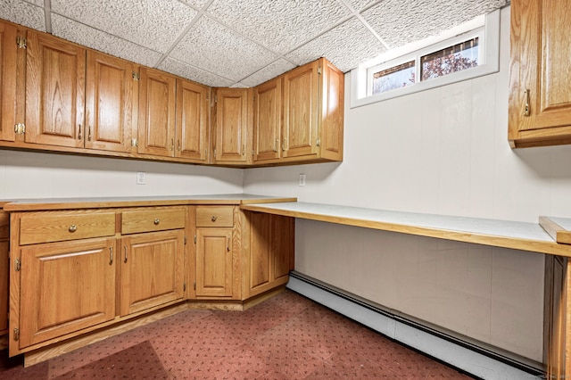 washroom featuring baseboard heating