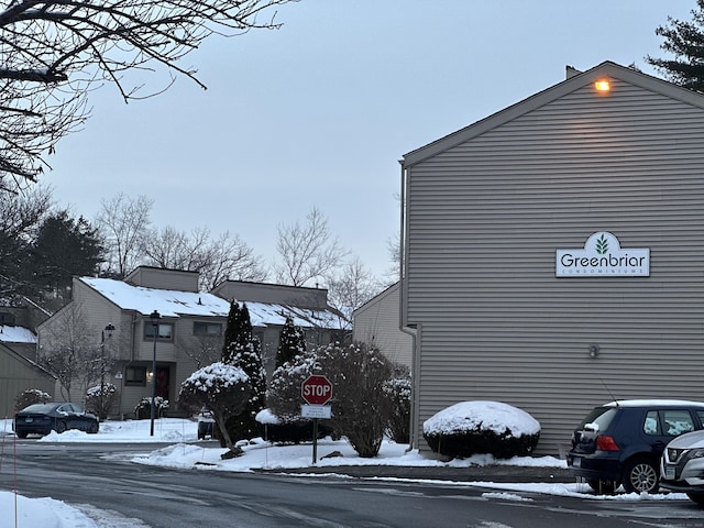 view of snow covered property