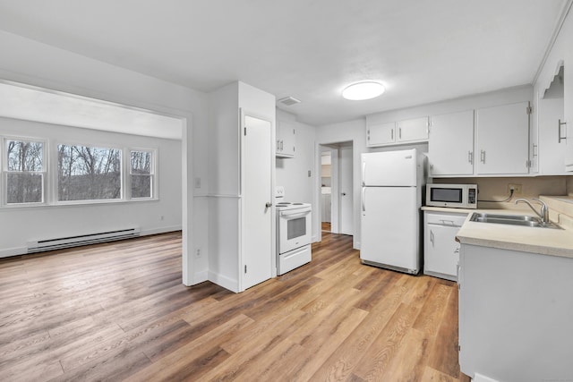 kitchen featuring a baseboard radiator, white appliances, white cabinets, sink, and light hardwood / wood-style flooring