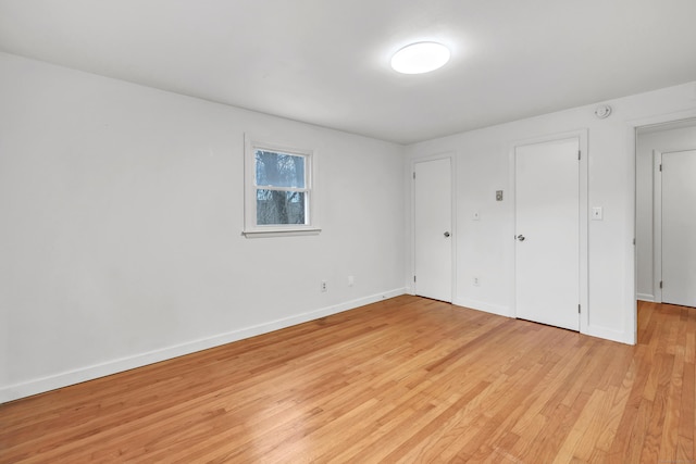 unfurnished bedroom with light hardwood / wood-style flooring