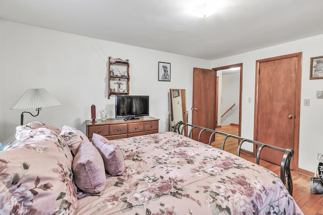 bedroom featuring light wood-type flooring