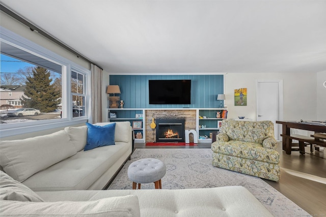 living room featuring a fireplace and hardwood / wood-style flooring