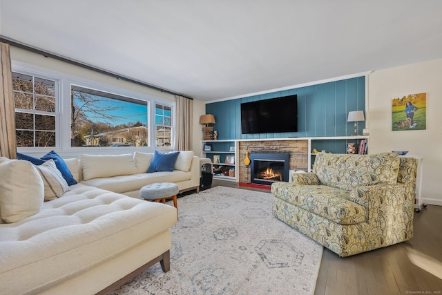 living room featuring hardwood / wood-style floors and a fireplace