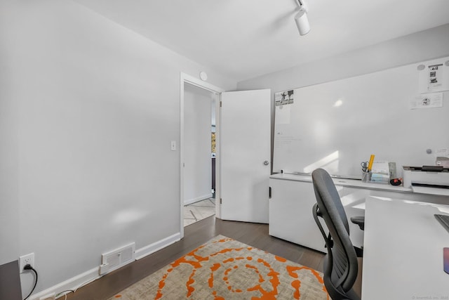 office area with dark wood-type flooring