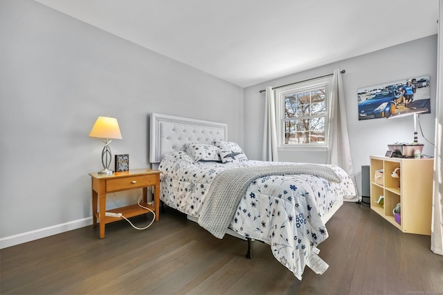 bedroom featuring dark wood-type flooring