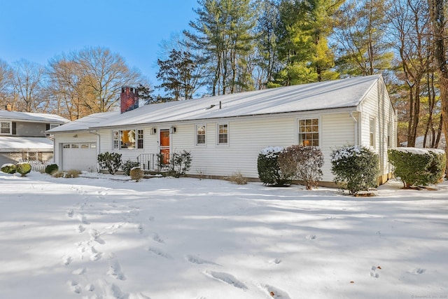 ranch-style house featuring a garage