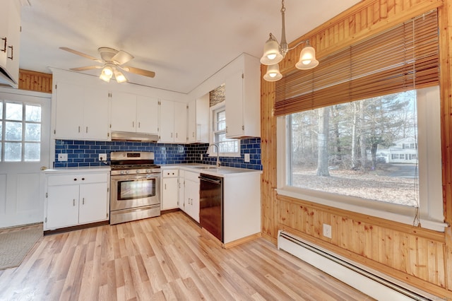 kitchen with white cabinetry, black dishwasher, baseboard heating, stainless steel gas stove, and pendant lighting