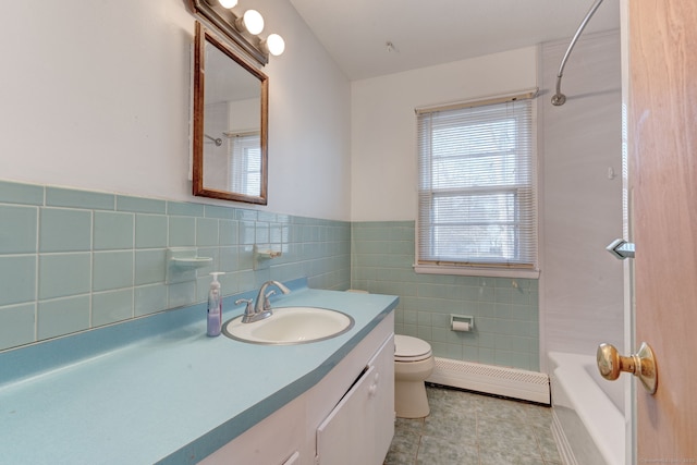 full bathroom with toilet, vanity, tile patterned floors, bathtub / shower combination, and baseboard heating