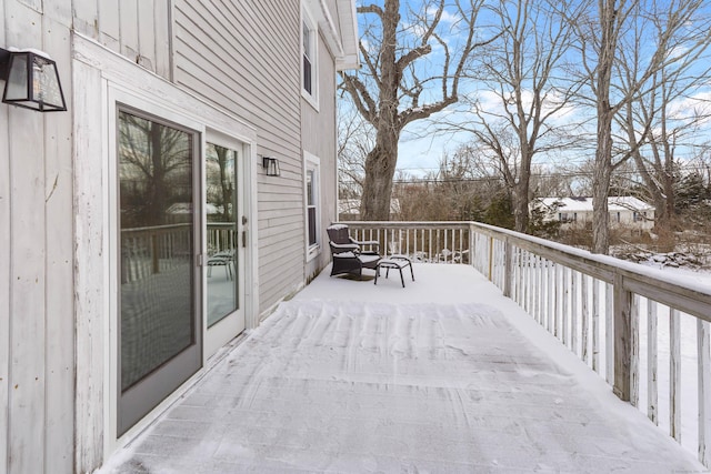 view of snow covered deck