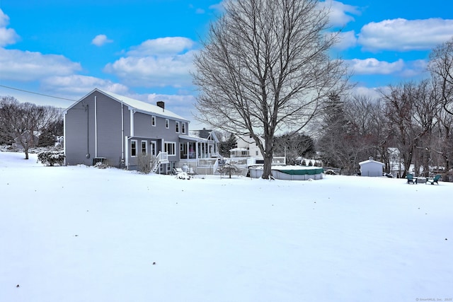 view of yard covered in snow