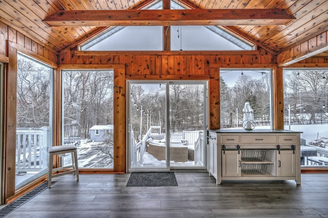 unfurnished sunroom featuring wooden ceiling and lofted ceiling with beams