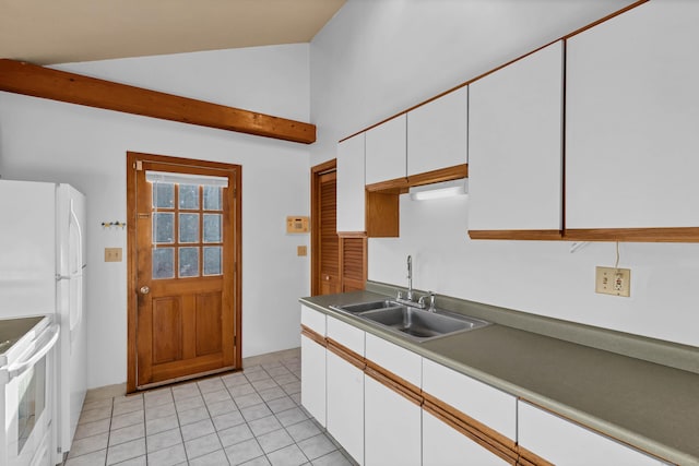 kitchen with vaulted ceiling, sink, white appliances, white cabinetry, and light tile patterned floors