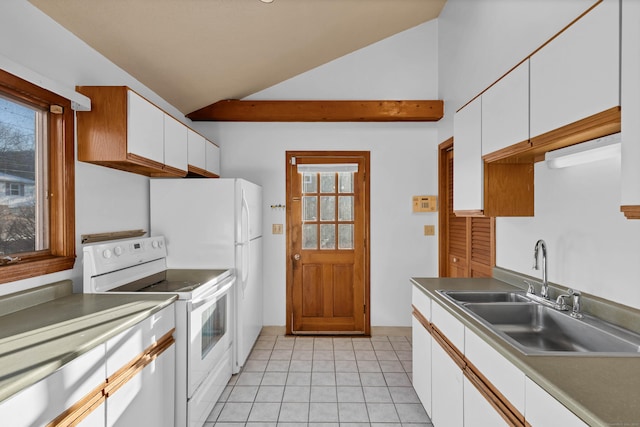 kitchen with vaulted ceiling, white range with electric stovetop, sink, light tile patterned flooring, and white cabinetry