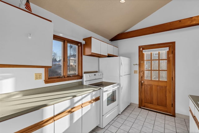 kitchen with vaulted ceiling, light tile patterned floors, white cabinetry, and white appliances