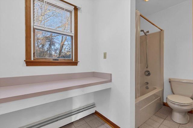 bathroom with toilet and bathing tub / shower combination