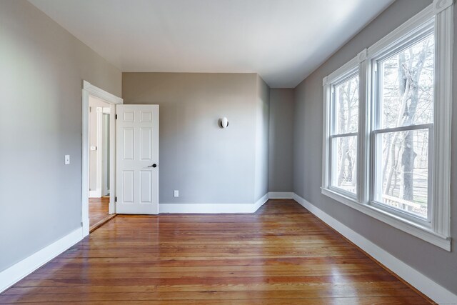 empty room featuring wood-type flooring