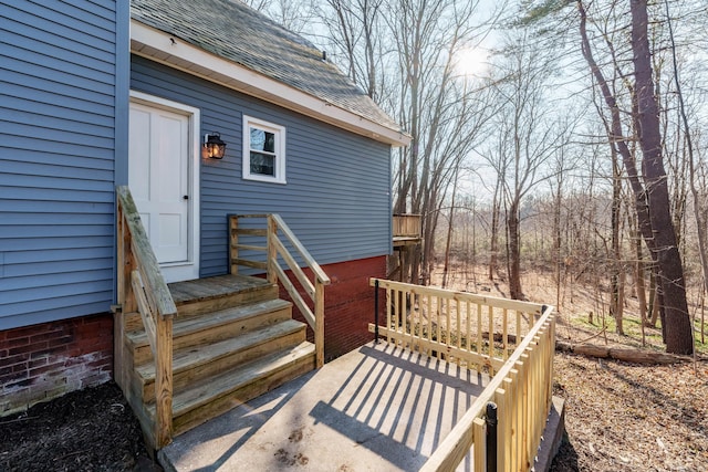 doorway to property with a wooden deck