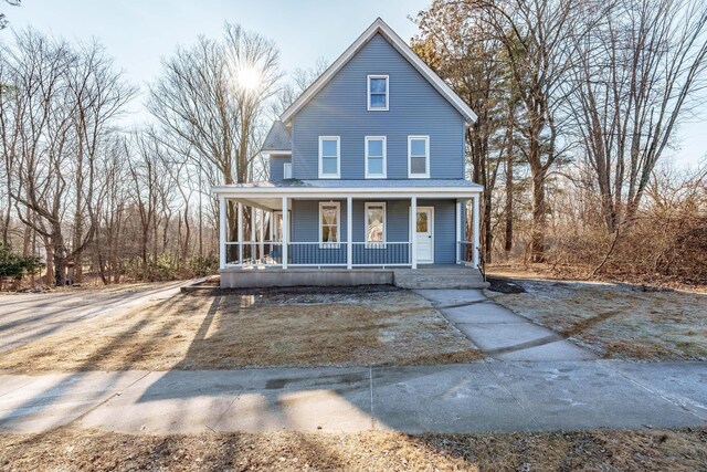 view of front of home featuring covered porch