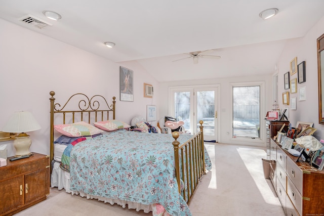 bedroom featuring ceiling fan, light colored carpet, access to outside, and vaulted ceiling