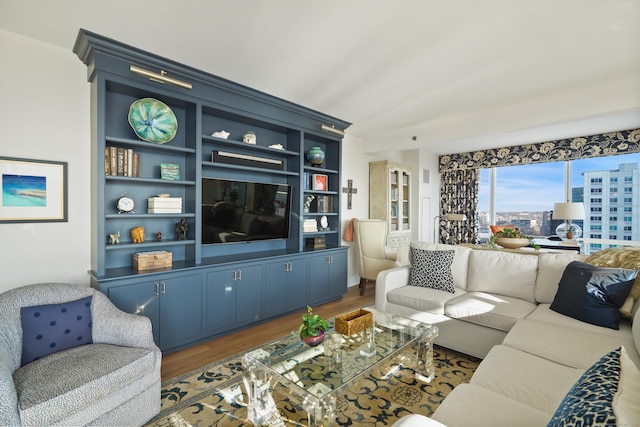 living room with dark hardwood / wood-style flooring