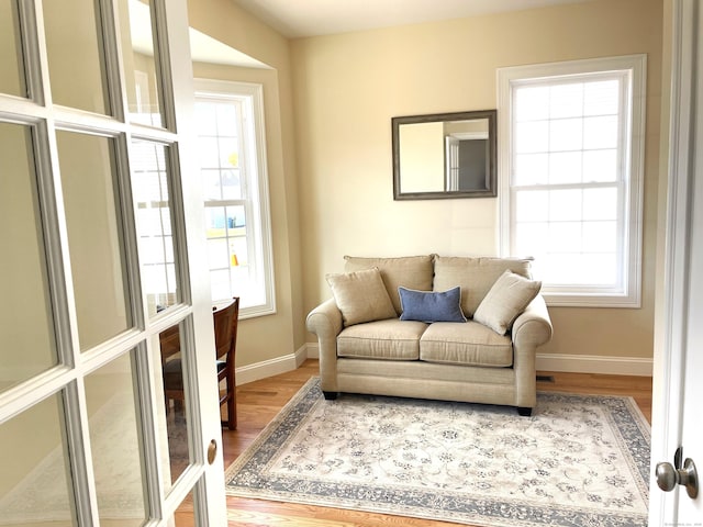 living area with wood-type flooring