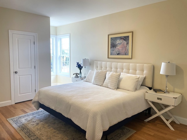 bedroom featuring hardwood / wood-style flooring