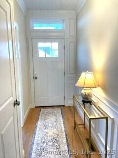 145 Webster Ln Unit 2-41, Middletown, CT 06457 - entryway featuring light wood-type flooring and ornamental molding