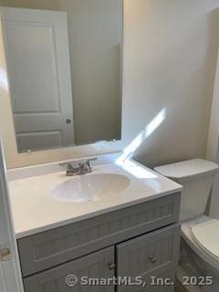 145 Webster Ln Unit 2-41, Middletown, CT 06457 - bathroom featuring vanity and toilet