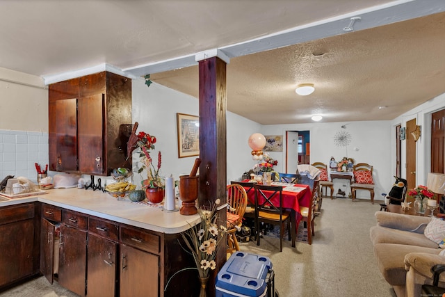 kitchen featuring a textured ceiling