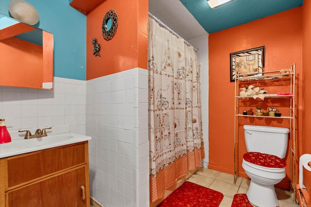 bathroom featuring toilet, walk in shower, tile patterned flooring, vanity, and backsplash