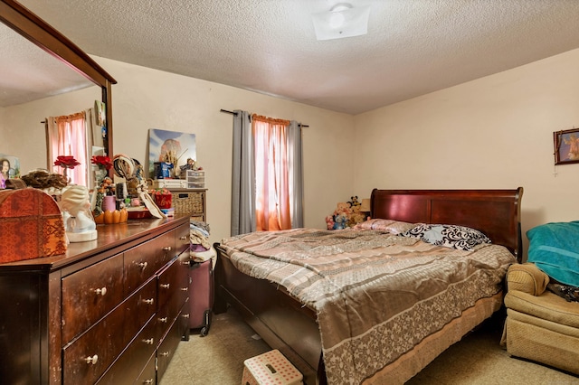 bedroom featuring a textured ceiling