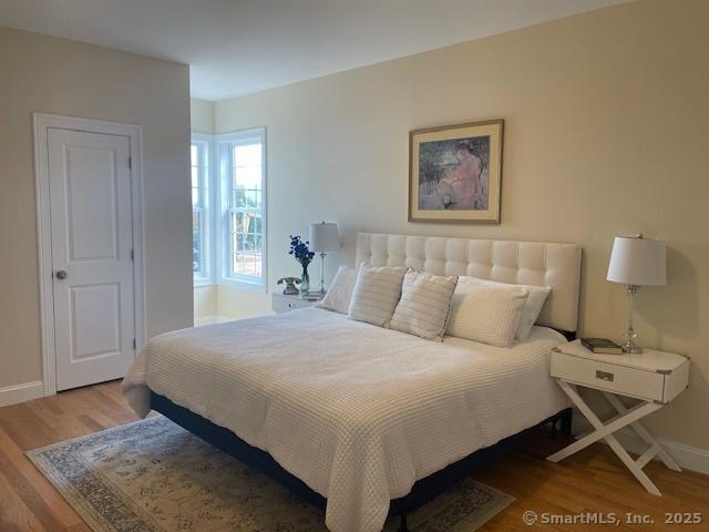 bedroom featuring hardwood / wood-style floors