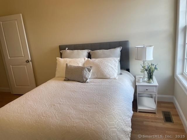 bedroom featuring hardwood / wood-style floors