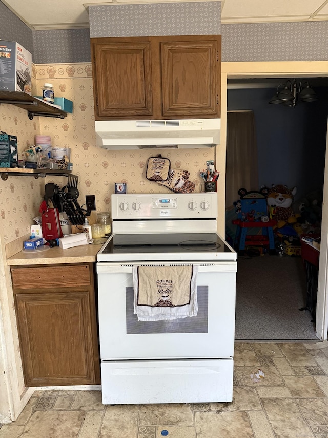 kitchen with white range with electric cooktop