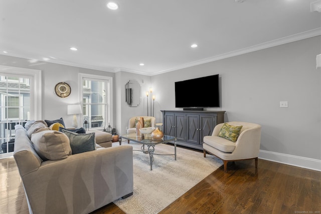 living room with dark hardwood / wood-style flooring and ornamental molding