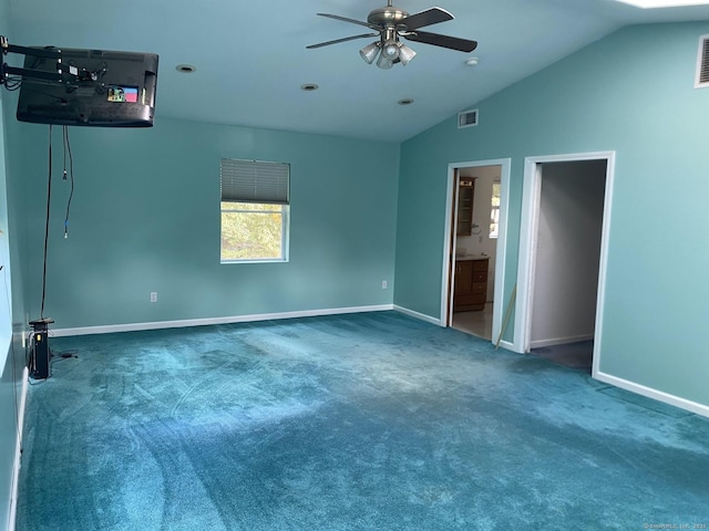 interior space with ceiling fan and vaulted ceiling